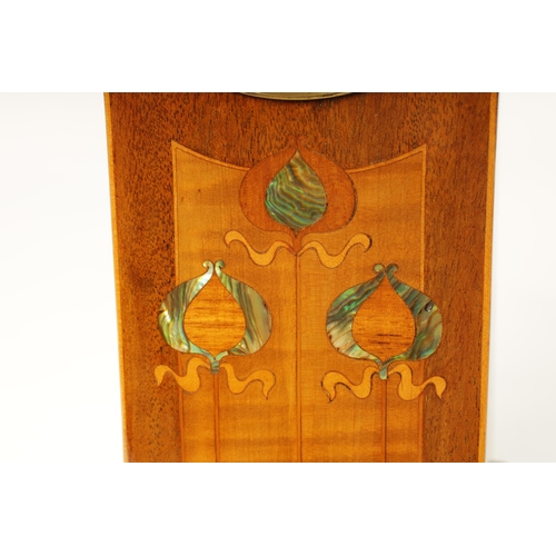 914 - AN EDWARDIAN ART NOUVEAU STYLE BOXWOOD STRUNG AND MAHOGANY INLAID MANTEL CLOCK the enamel Roman dial... 