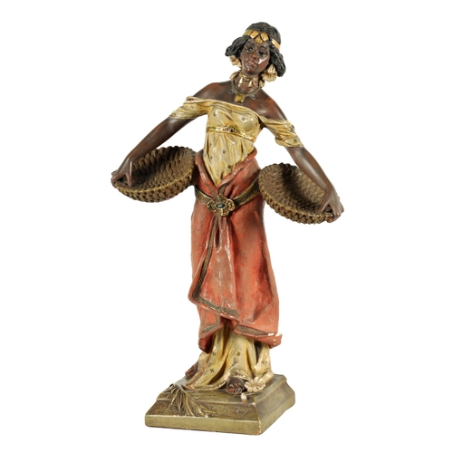 93 - A 20TH CENTURY URIELA TERRACOTTA POLYCHROME FIGURE finely modelled and coloured depicting a standing... 