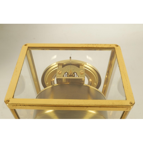 931 - A 1960'S JAEGER-LECOULTRE ATMOS CLOCK the glazed gilt case with canted corners enclosing a skeletoni... 