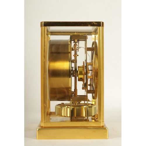 931 - A 1960'S JAEGER-LECOULTRE ATMOS CLOCK the glazed gilt case with canted corners enclosing a skeletoni... 