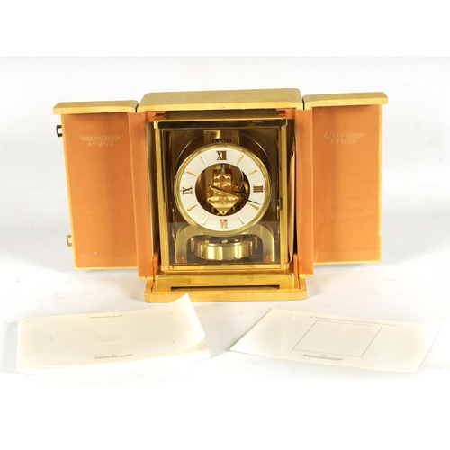 931 - A 1960'S JAEGER-LECOULTRE ATMOS CLOCK the glazed gilt case with canted corners enclosing a skeletoni... 