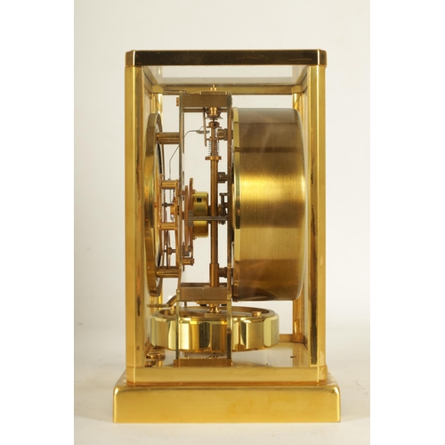 931 - A 1960'S JAEGER-LECOULTRE ATMOS CLOCK the glazed gilt case with canted corners enclosing a skeletoni... 