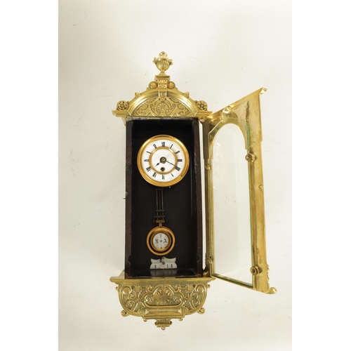 935 - A 19TH CENTURY MINIATURE BRASS AND EBONISED VIENNA STYLE WALL CLOCK the case with relief work brass ... 