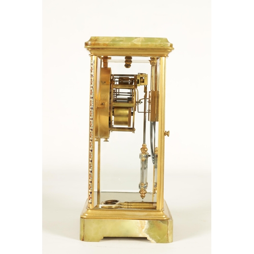 940 - A LATE 19TH CENTURY FRENCH CHAMPLEVE ENAMEL, ONYX AND BRASS FOUR GLASS MANTEL CLOCK the glazed case ... 