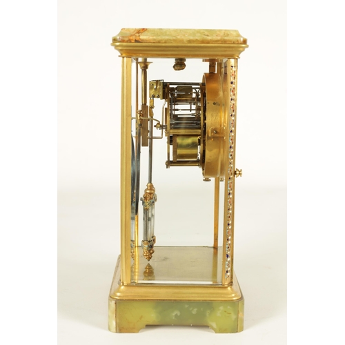 940 - A LATE 19TH CENTURY FRENCH CHAMPLEVE ENAMEL, ONYX AND BRASS FOUR GLASS MANTEL CLOCK the glazed case ... 