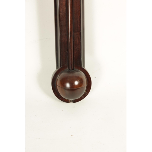 945 - A MID 18TH CENTURY PROVINCIAL MAHOGANY STICK BAROMETER the swan neck pediment above a glazed door en... 