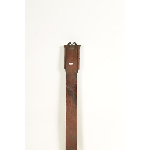 945 - A MID 18TH CENTURY PROVINCIAL MAHOGANY STICK BAROMETER the swan neck pediment above a glazed door en... 