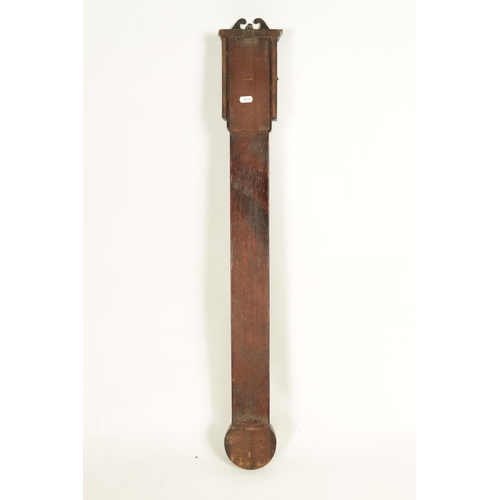 945 - A MID 18TH CENTURY PROVINCIAL MAHOGANY STICK BAROMETER the swan neck pediment above a glazed door en... 