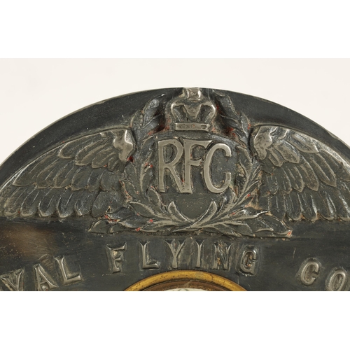 950 - A ROYAL FLYING CORPS MANTEL CLOCK the arched pewter case with RFC winged emblem inscribed below 'ROY... 