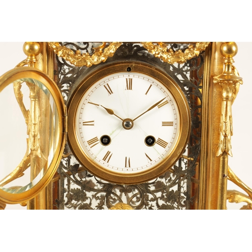 951 - A LATE 19TH CENTURY FRENCH GLAZED ORMOLU MANTEL CLOCK The case surmounted by two ormolu cherubs abov... 