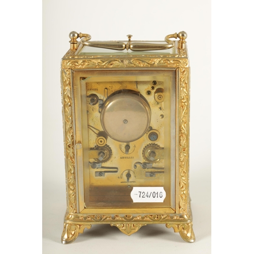 958 - A LATE 19TH CENTURY FRENCH REPEATING CARRIAGE CLOCK the gilt brass foliate relief work case with bev... 