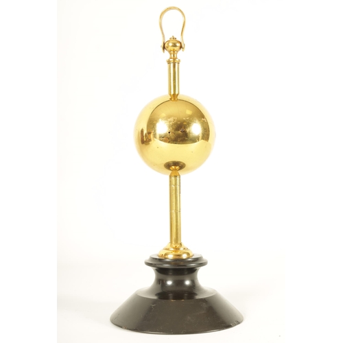 976 - AN UNUSUAL EARLY 20TH CENTURY FRENCH GRAVITY SAW CLOCK the brass spherical ball weighted case with e... 