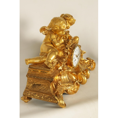 982 - A LARGE 19TH CENTURY FRENCH FIGURAL ORMOLU MANTEL CLOCK surmounted by two cherubs on a leaf work bas... 