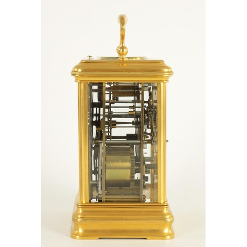 984 - AN UNUSUAL LATE 19TH CENTURY GILT BRASS GRAND SONNERIE CARRIAGE CLOCK the moulded case with rounded ... 