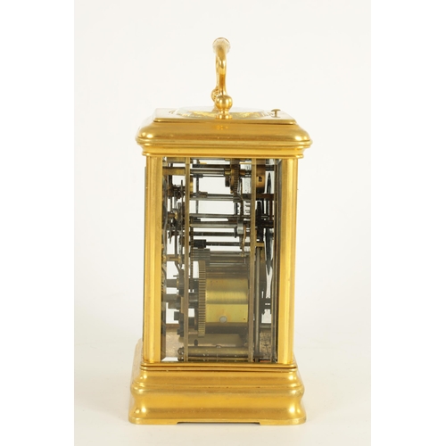 984 - AN UNUSUAL LATE 19TH CENTURY GILT BRASS GRAND SONNERIE CARRIAGE CLOCK the moulded case with rounded ... 