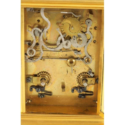 984 - AN UNUSUAL LATE 19TH CENTURY GILT BRASS GRAND SONNERIE CARRIAGE CLOCK the moulded case with rounded ... 