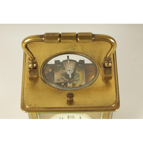 987 - A LATE 19TH CENTURY FRENCH EIGHT-DAY REPEATING BRASS CASED CARRIAGE CLOCK the masked dial with Arabi... 