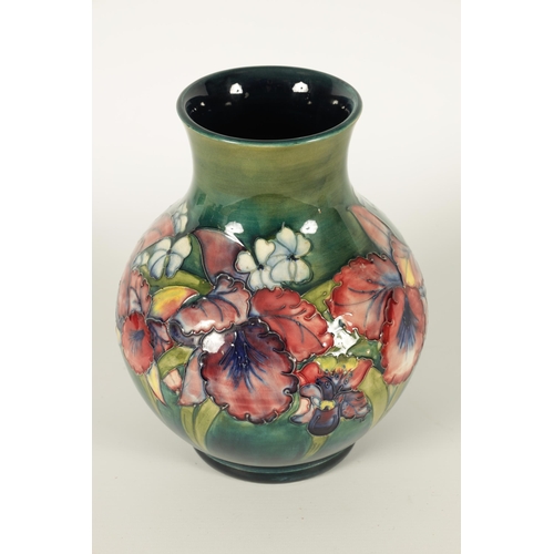 99 - A 20TH CENTURY MOORCROFT ORCHIDS PATTERN BULBOUS VASE with tube lined flower decoration Walter Moorc... 