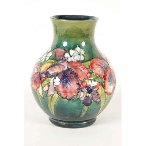 99 - A 20TH CENTURY MOORCROFT ORCHIDS PATTERN BULBOUS VASE with tube lined flower decoration Walter Moorc... 