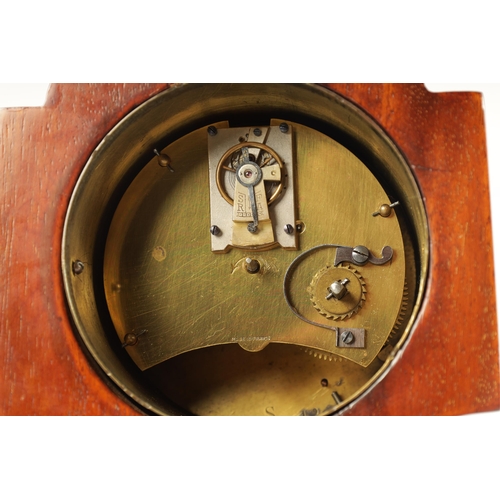 997 - AN EDWARDIAN ART NOUVEAU STYLE BOXWOOD STRUNG AND MAHOGANY INLAID MANTEL CLOCK the enamel Roman dial... 