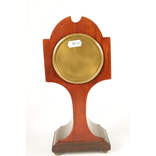 997 - AN EDWARDIAN ART NOUVEAU STYLE BOXWOOD STRUNG AND MAHOGANY INLAID MANTEL CLOCK the enamel Roman dial... 