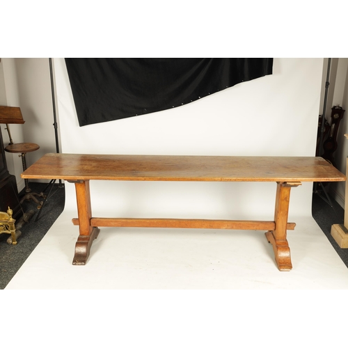 1197 - A 17TH CENTURY WALNUT TRESTLE TABLE the two piece top above square end supports with sledge feet joi... 