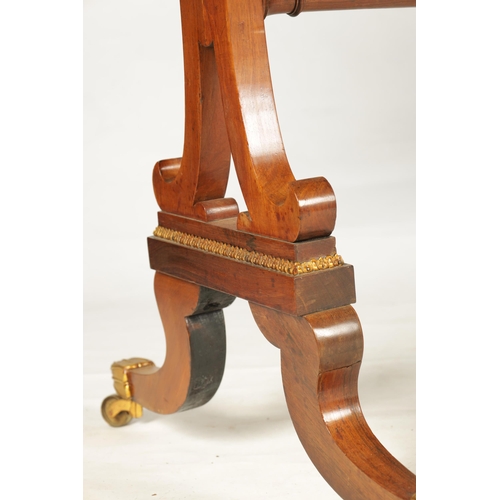 1198 - A REGENCY BRASS MOUNTED FIGURED ROSEWOOD SOFA TABLE with fold-down ends enclosing two frieze drawers... 