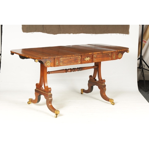 1198 - A REGENCY BRASS MOUNTED FIGURED ROSEWOOD SOFA TABLE with fold-down ends enclosing two frieze drawers... 