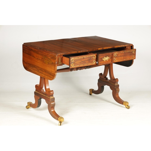 1198 - A REGENCY BRASS MOUNTED FIGURED ROSEWOOD SOFA TABLE with fold-down ends enclosing two frieze drawers... 