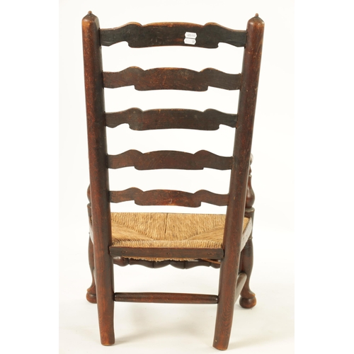 1200 - A 19TH CENTURY ASH AND ELM LADDER BACK CHILDS CHAIR with rushwork seat (44.5cm wide 83cm high )