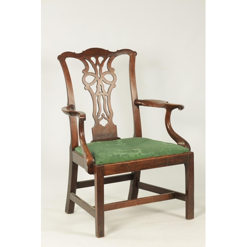 1201 - AN EARLY GEORGE III CHIPPENDALE DESIGN MAHOGANY OPEN ARM CHAIR OF GENEROUS SIZE the shaped top rail ... 