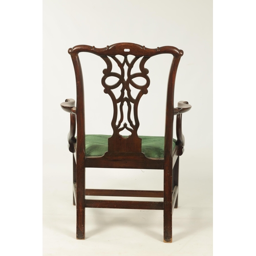 1201 - AN EARLY GEORGE III CHIPPENDALE DESIGN MAHOGANY OPEN ARM CHAIR OF GENEROUS SIZE the shaped top rail ... 