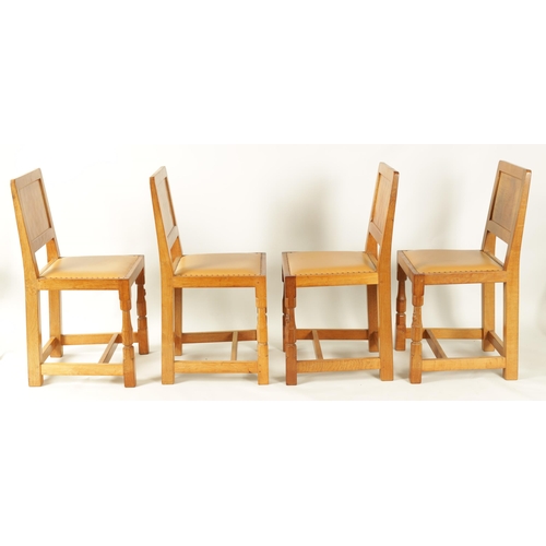 1203 - A SET OF SIX ROBERT 'MOUSEMAN' THOMPSON AZED OAK DINING CHAIRS with panel backs and hide leather sea... 