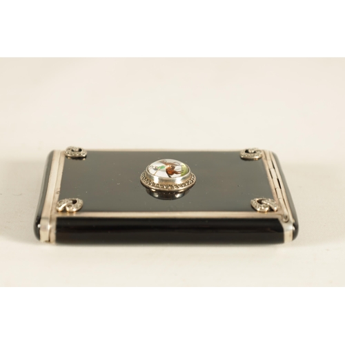 304 - A LATE 19TH/EARLY 20TH CENTURY SILVER AND BLACK ENAMEL LADIES CIGARETTE CASE with sprung end and hin... 