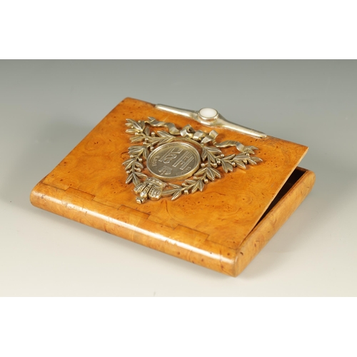 307 - AN EARLY 20TH CENTURY FABERGE SILVER MOUNTED KARELIAN BIRCH CIGARETTE CASE the hinged lid with centr... 