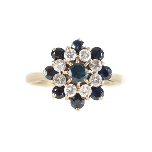 314 - A LADIES 18CT WHITE GOLD SAPPHIRE AND DIAMOND RING The brilliant cut stones having a centre sapphire... 