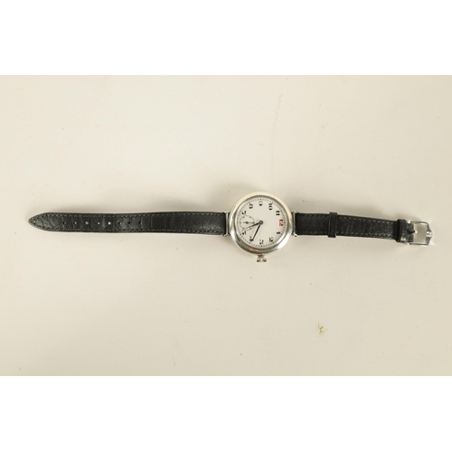 319 - A 1920s GENTLEMAN'S SILVER LONGINES WRISTWATCH on black leather strap having a circular moulded case... 