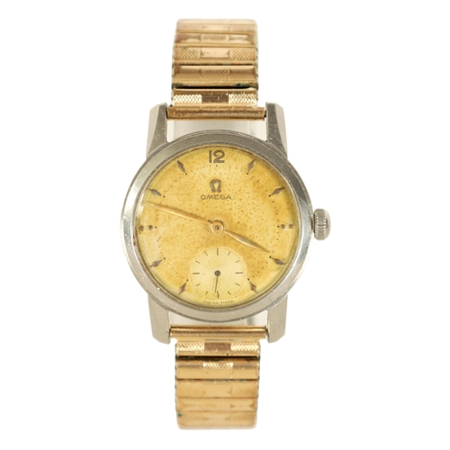 325 - A GENTLEMAN'S 1950's STEEL OMEGA WRIST WATCH on later bracelet, the discoloured champagne dial with ... 