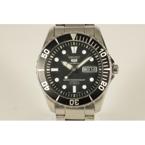 332 - A GENTLEMAN'S SEIKO 5 SPORTS AUTOMATIC STAINLESS STEEL WRISTWATCH the black dial with luminous numer... 