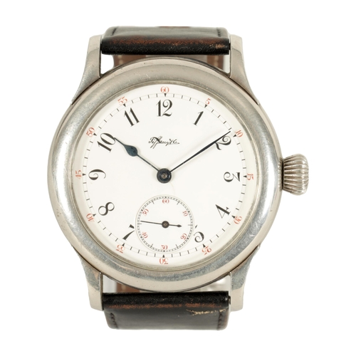 334 - A 20TH CENTURY OVERSIZED WRISTWATCH BY TIFFANY & CO. NEW YORK NUMBERED 71622 with steel case enclosi... 