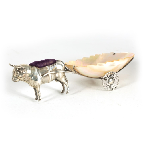 339 - AN UNUSUAL EDWARD VII SILVER AND MOTHER OF PEARL PIN CUSHION modelled as an Ox pulling a cart - hall... 