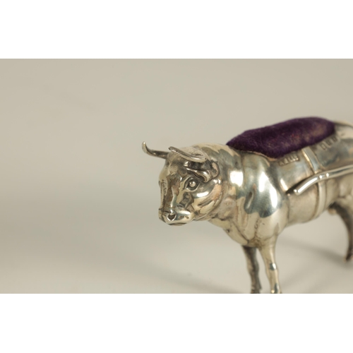 339 - AN UNUSUAL EDWARD VII SILVER AND MOTHER OF PEARL PIN CUSHION modelled as an Ox pulling a cart - hall... 