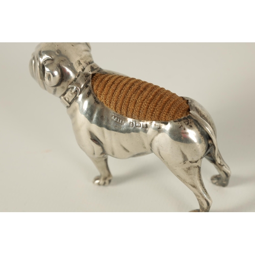 340 - A VICTORIAN SMALL SILVER PIN CUSHION IN THE FORM OF A BULLDOG modelled in a standing position with c... 