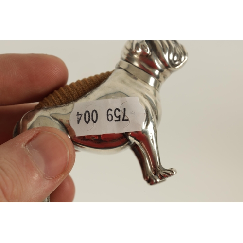 340 - A VICTORIAN SMALL SILVER PIN CUSHION IN THE FORM OF A BULLDOG modelled in a standing position with c... 