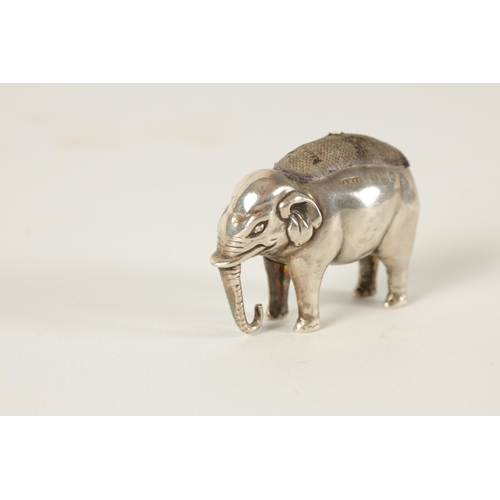 341 - AN EDWARD VII SMALL SILVER PIN CUSHION IN THE FORM OF AN ELEPHANT with the original cushion, Adie an... 