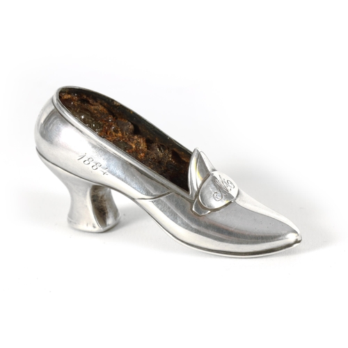 347 - A LATE 19TH CENTURY SILVER PIN CUSHION CASE FORMED A SHOE dated 1884 and 1909, hallmarked sterling s... 