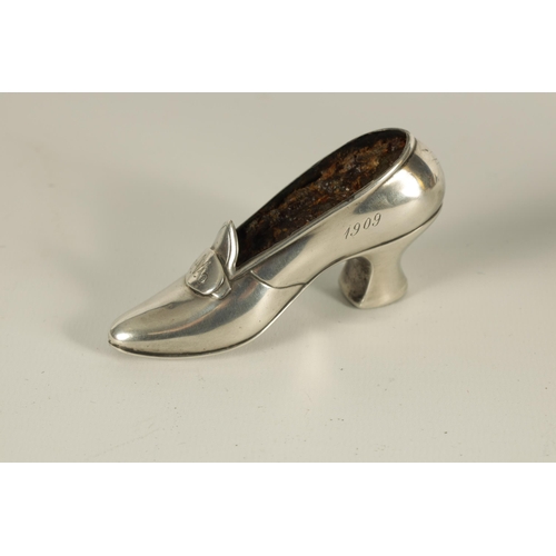 347 - A LATE 19TH CENTURY SILVER PIN CUSHION CASE FORMED A SHOE dated 1884 and 1909, hallmarked sterling s... 