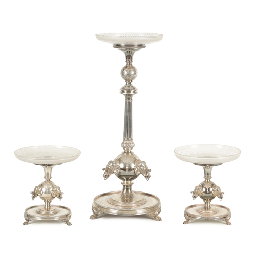 349 - A 19TH CENTURY SILVER PLATED THREE PIECE GARNITURE EPERGNE the tall centrepiece with etched glass to... 