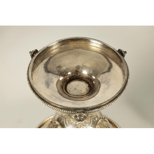 349 - A 19TH CENTURY SILVER PLATED THREE PIECE GARNITURE EPERGNE the tall centrepiece with etched glass to... 