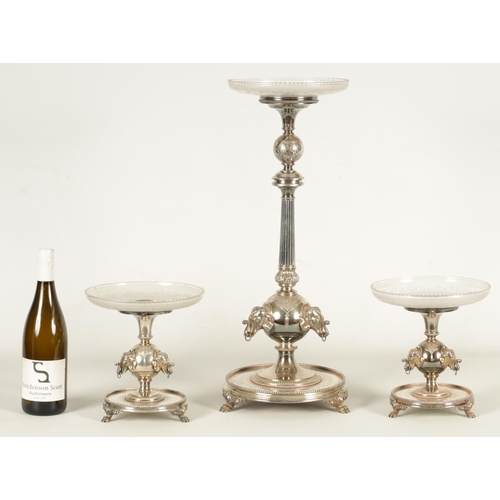 349 - A 19TH CENTURY SILVER PLATED THREE PIECE GARNITURE EPERGNE the tall centrepiece with etched glass to... 